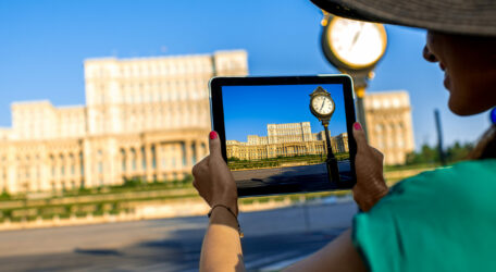 Photographing parliament building in Bucharest