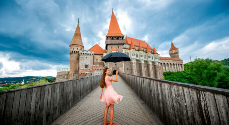 Female tourist near the Corvin castle