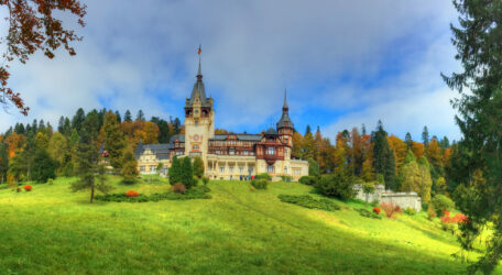Beautiful panorama with famous and medieval Peles castle in autumn season, Sinaia,  Romania